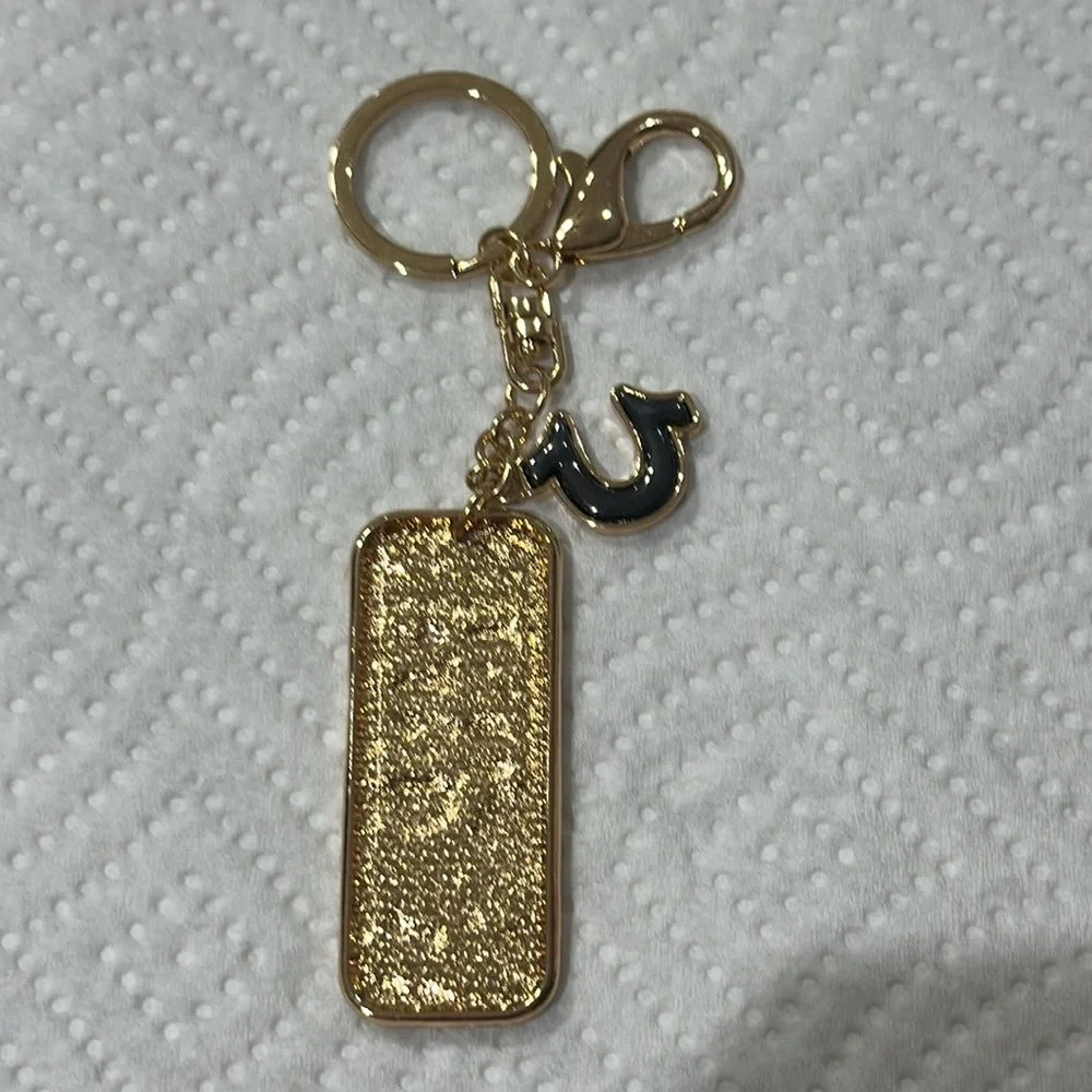 True Religion Gold and Black Keychain NEW